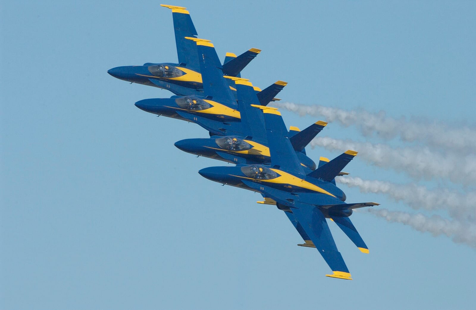 U.S. Navy Blue Angels flying in tight diamond formation