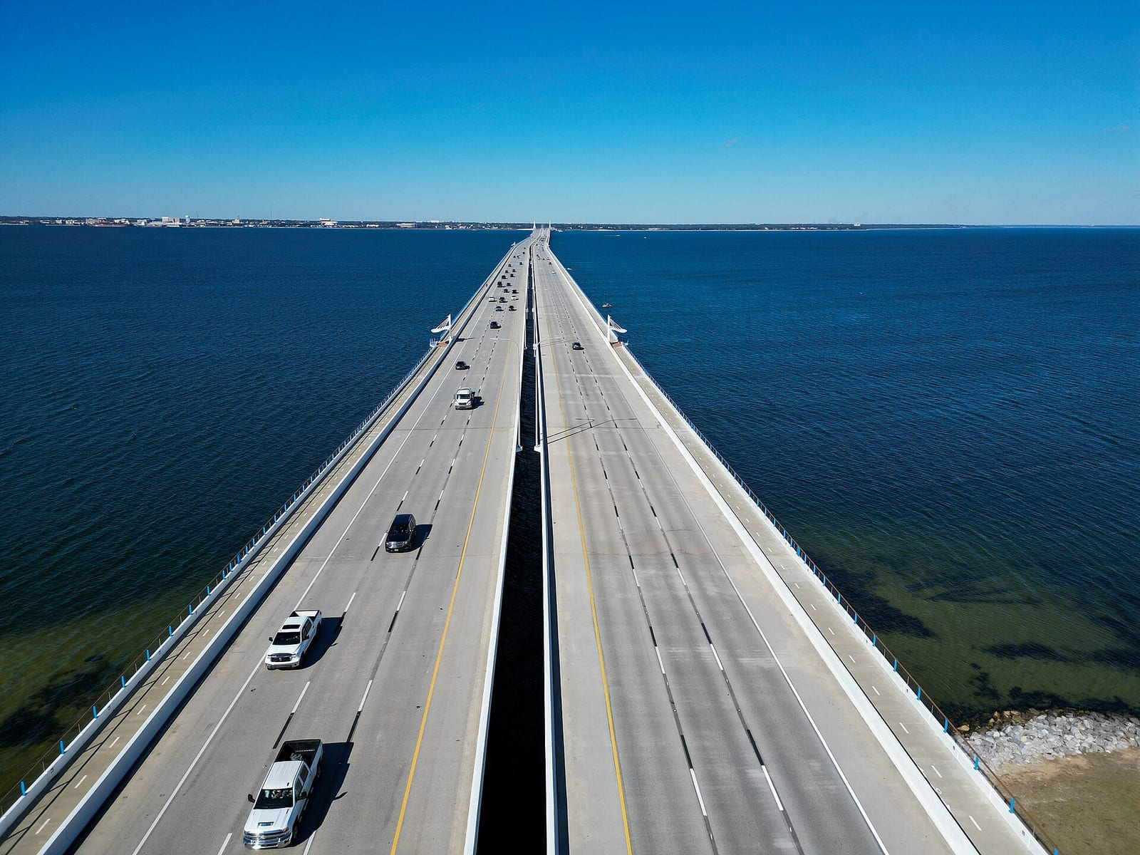 Pensacola Bay Bridge stretching north across the water from Gulf Breeze, Florida