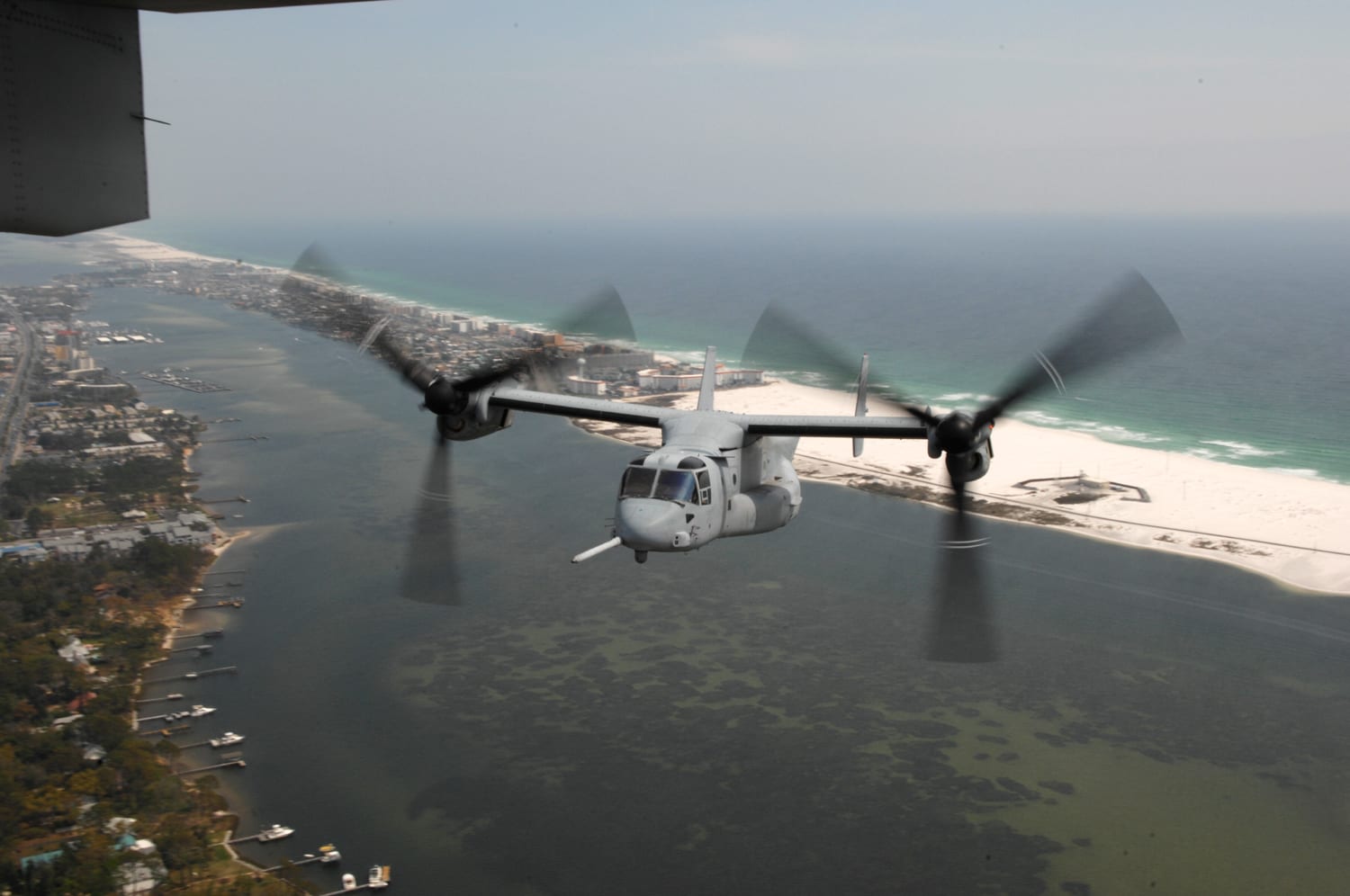 MV-22 Osprey flying over Santa Rosa Sound and the barrier island near Fort Walton Beach