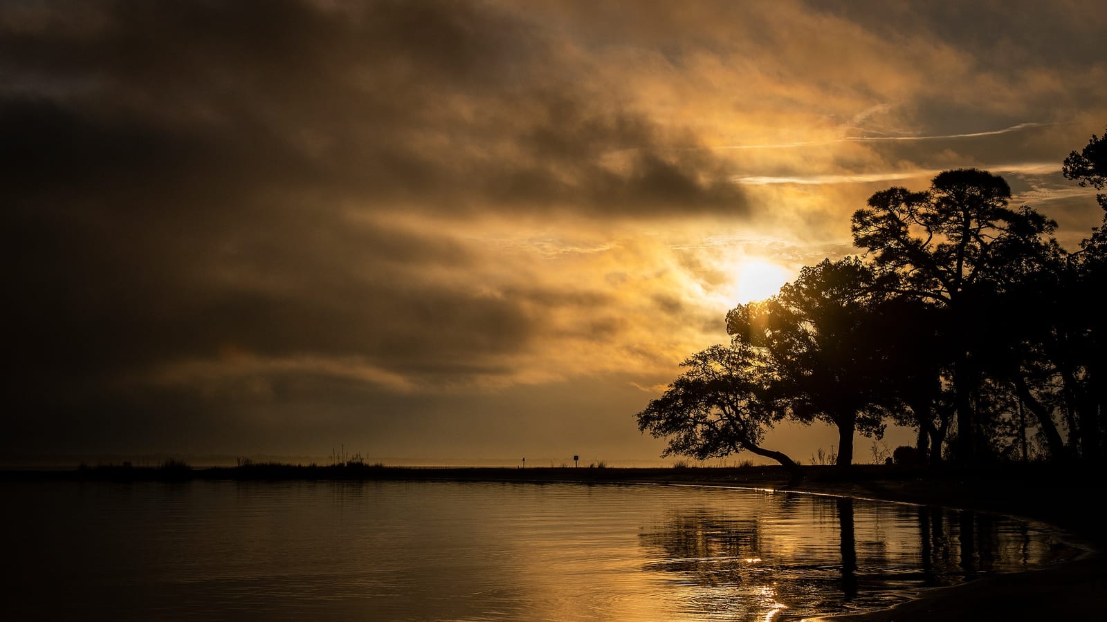 Golden sunrise over Choctawhatchee Bay near Niceville, Florida